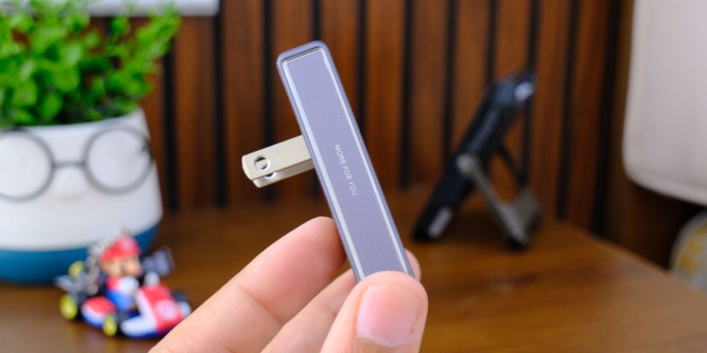 A hand holding a usb stick