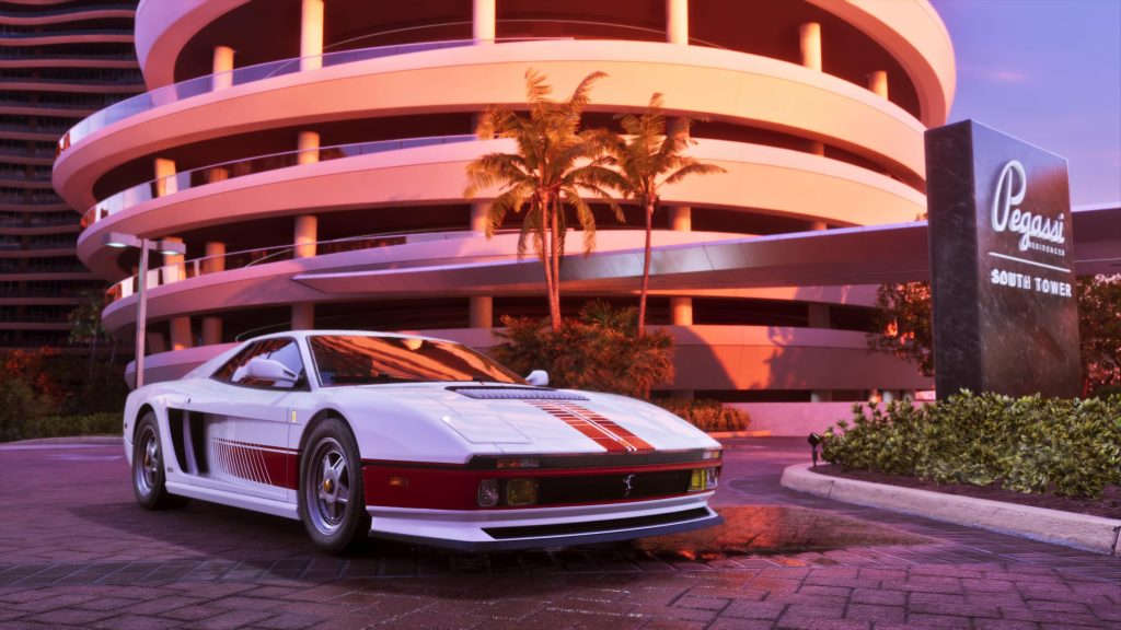 A white sports car parked in front of a round building