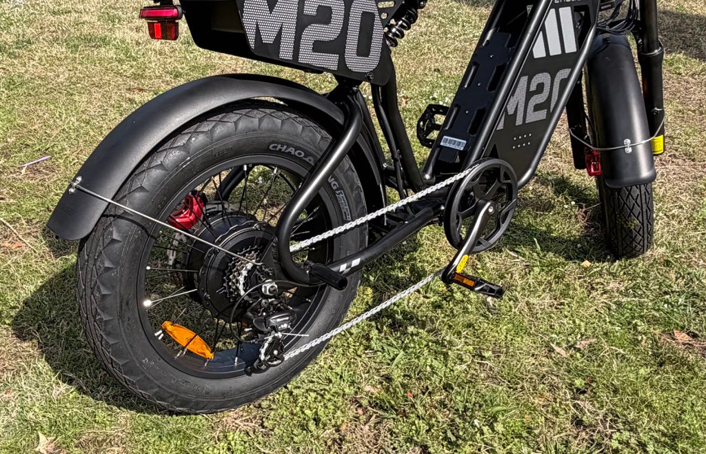 A black bike with a chain attached to it