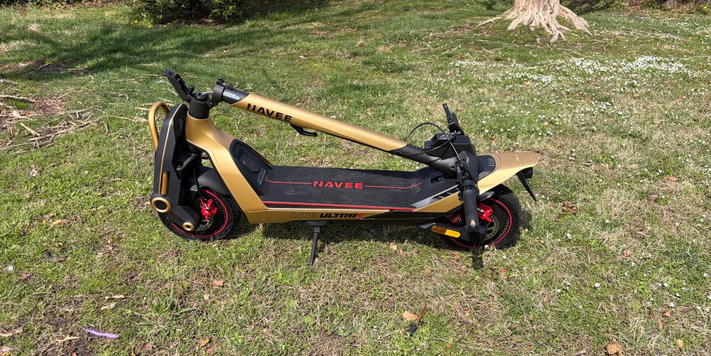 A gold scooter on grass
