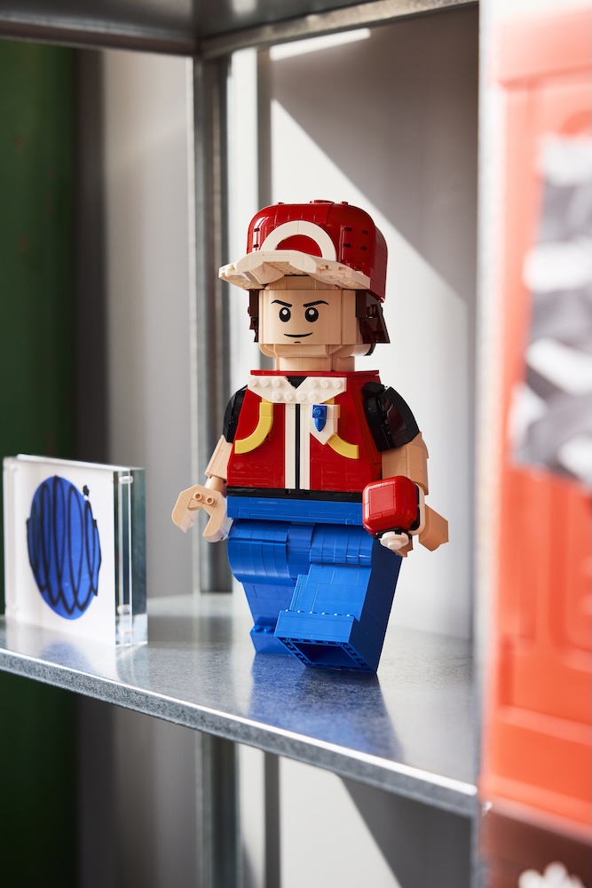 A lego figure on a shelf