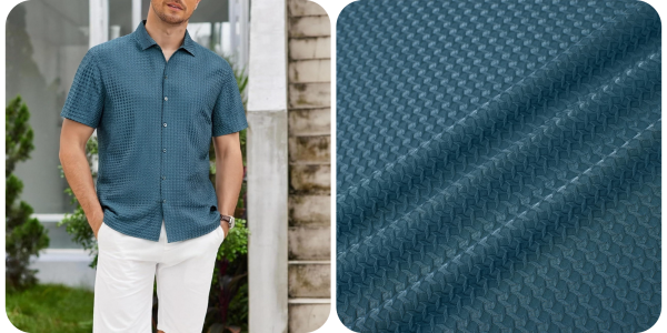 A man standing next to a fabric