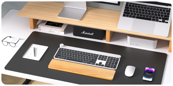 A desk with a keyboard and mouse