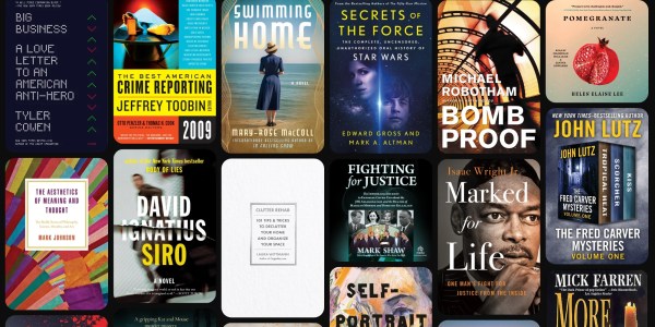 A collection of books on a black background