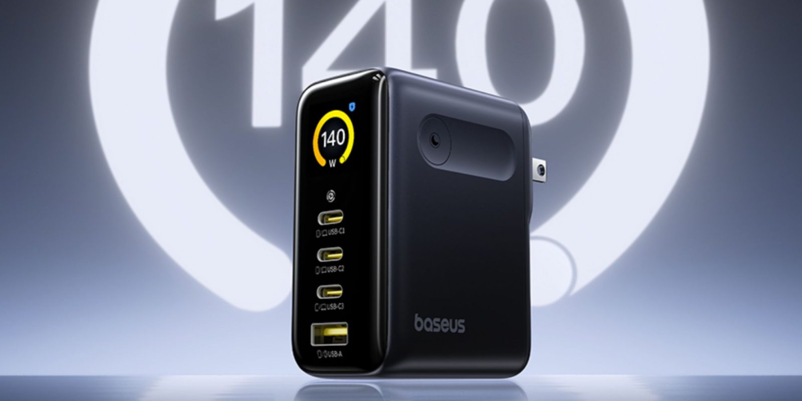 A black device with a yellow and black display
