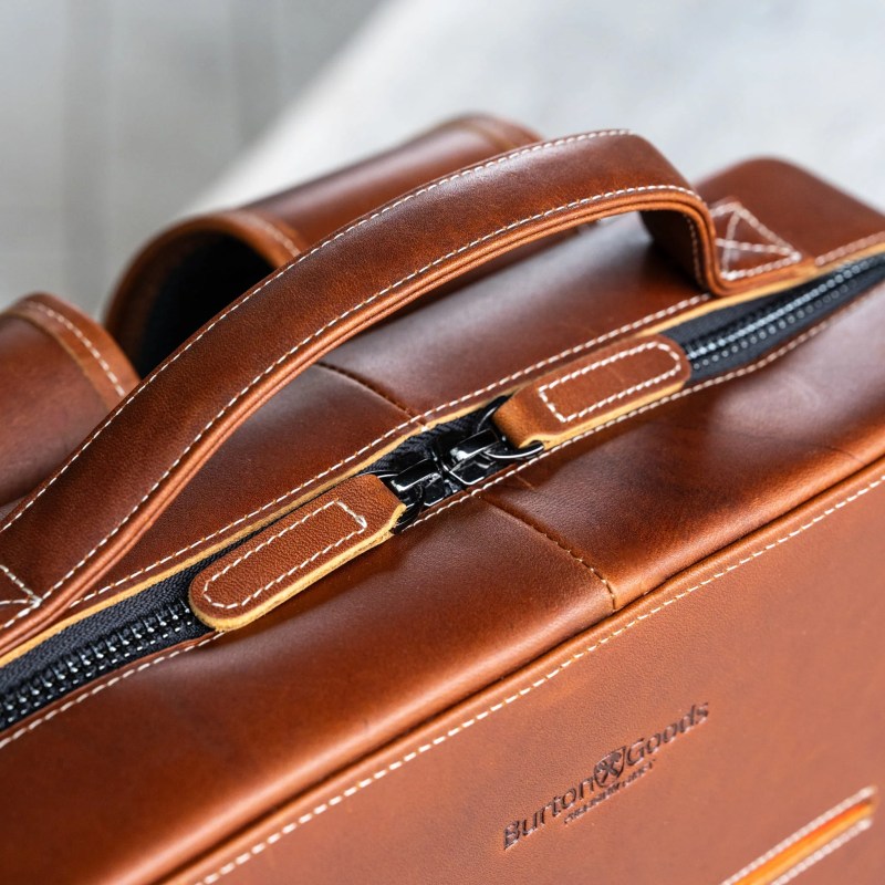 A close up of a brown leather bag