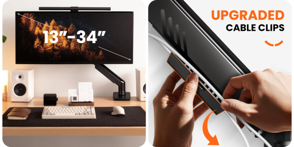 A hand holding a computer monitor