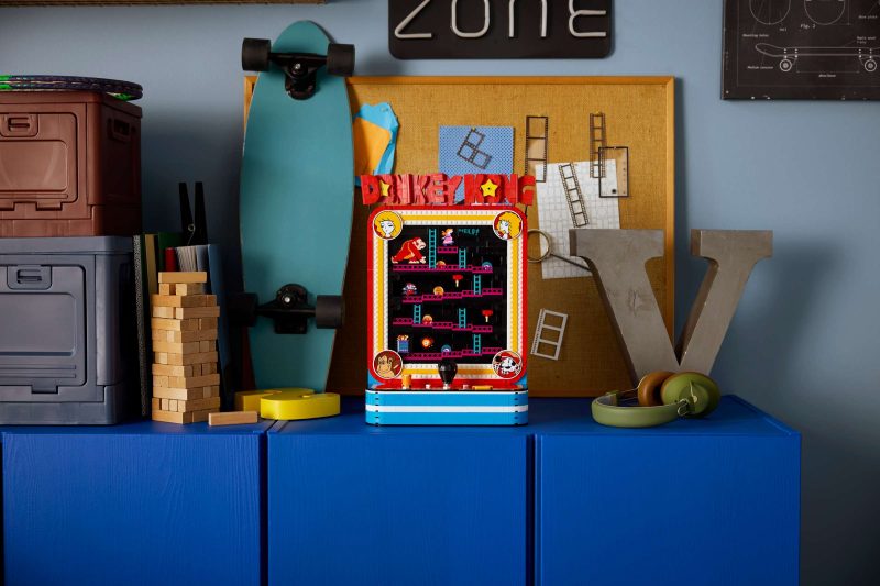 A blue cabinet with a toy game on it