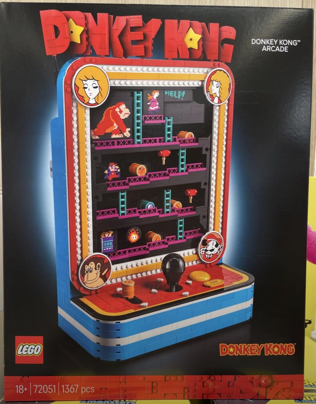 A box of toy arcade game