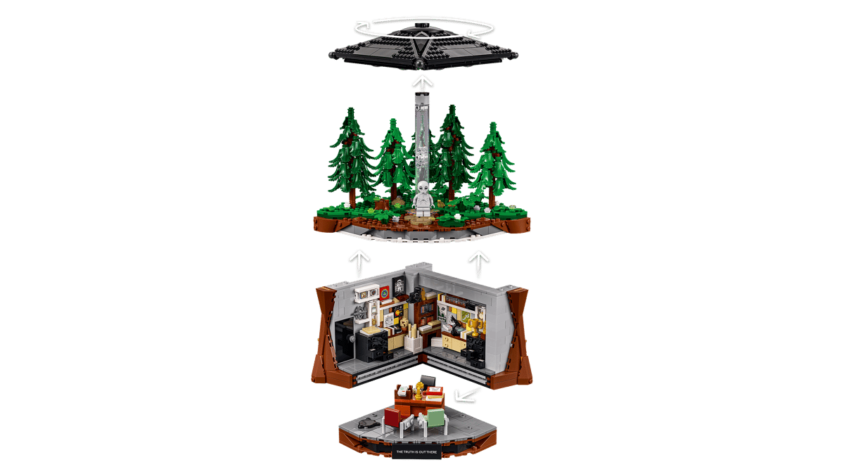 A model of a house with trees and a white figure