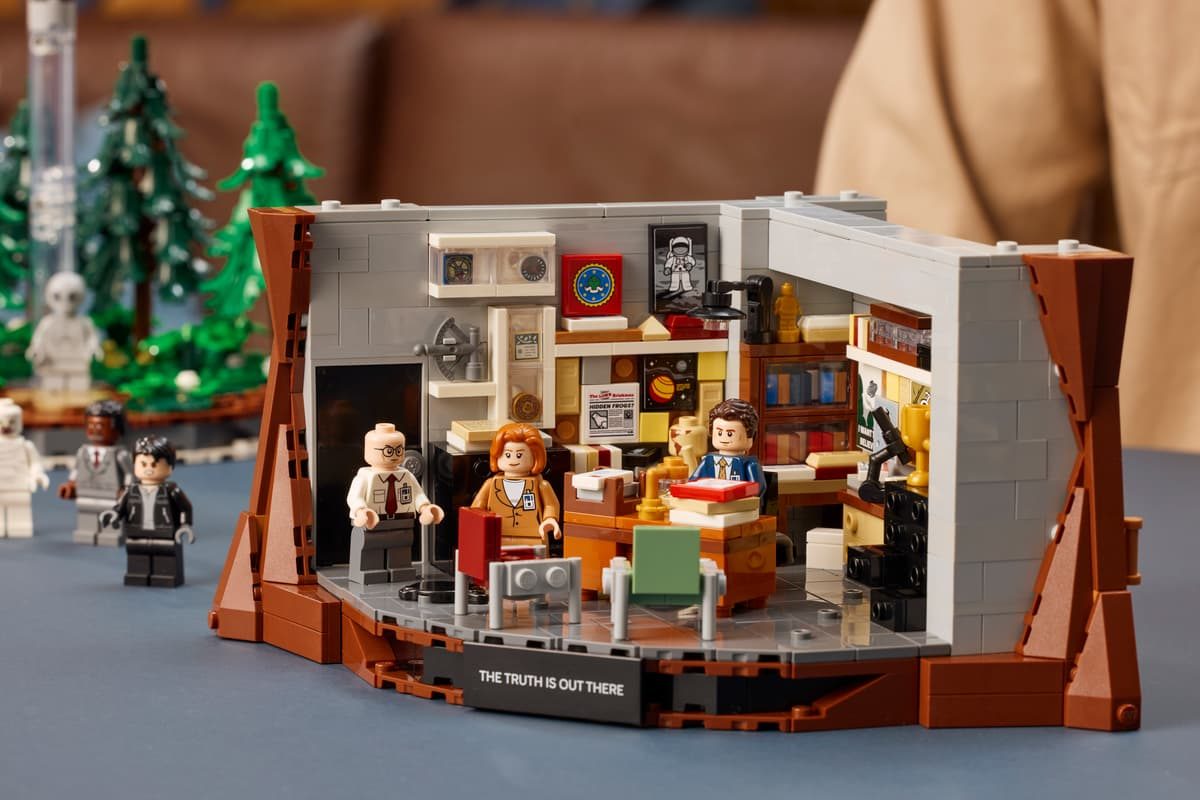 A toy building set with people in a room