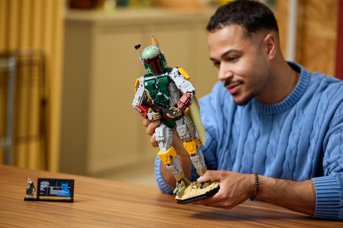 A man holding a toy