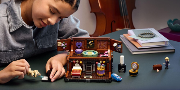 A girl playing with legos
