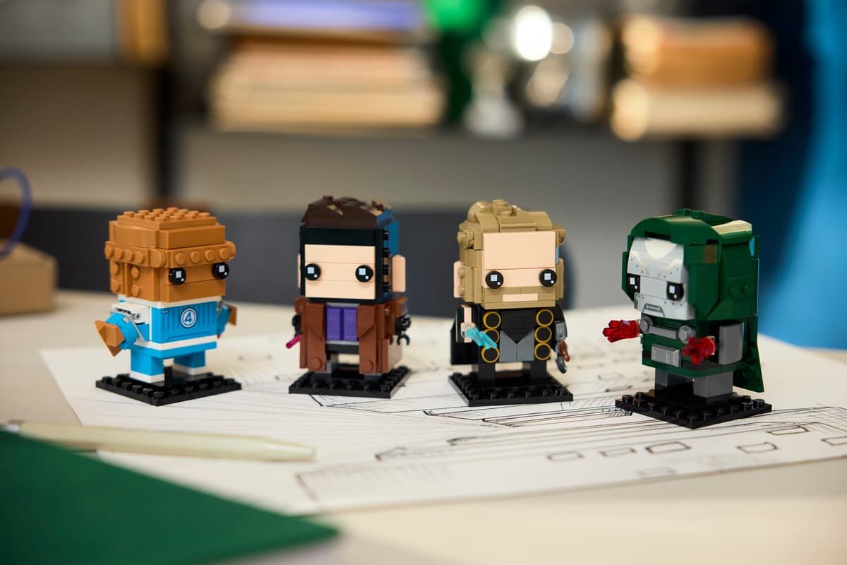A group of toy figures on a paper