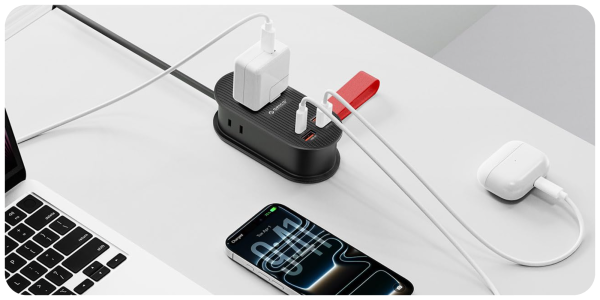 A phone with a charger plugged into it