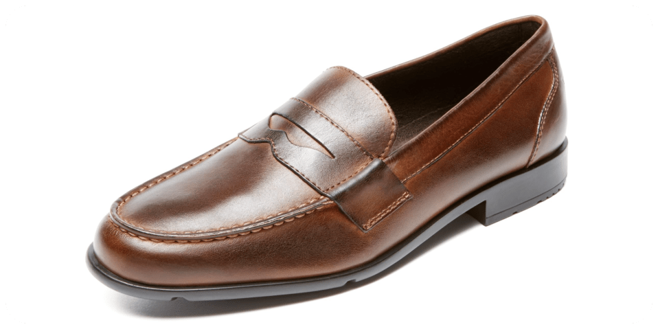A brown loafer with a white background