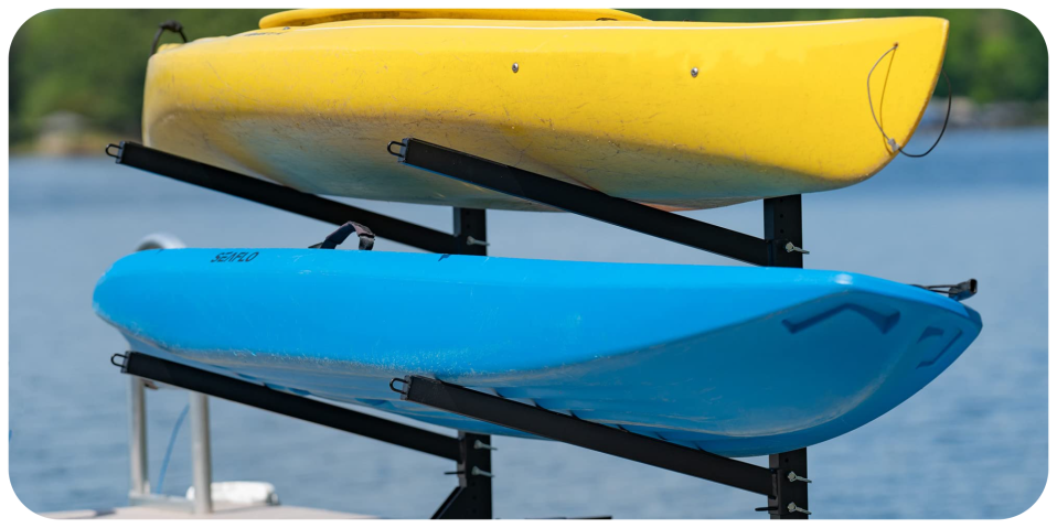 A yellow and blue kayaks on a rack