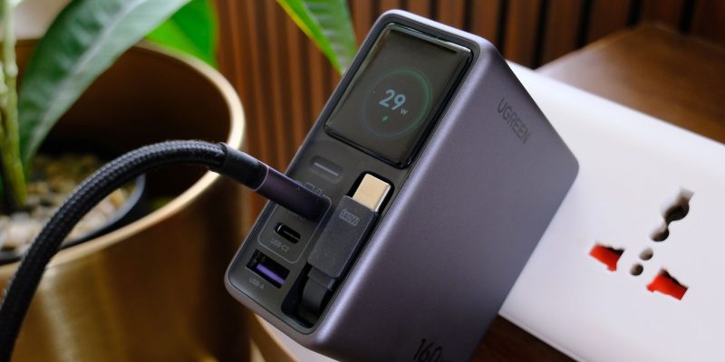A black device with a black cable