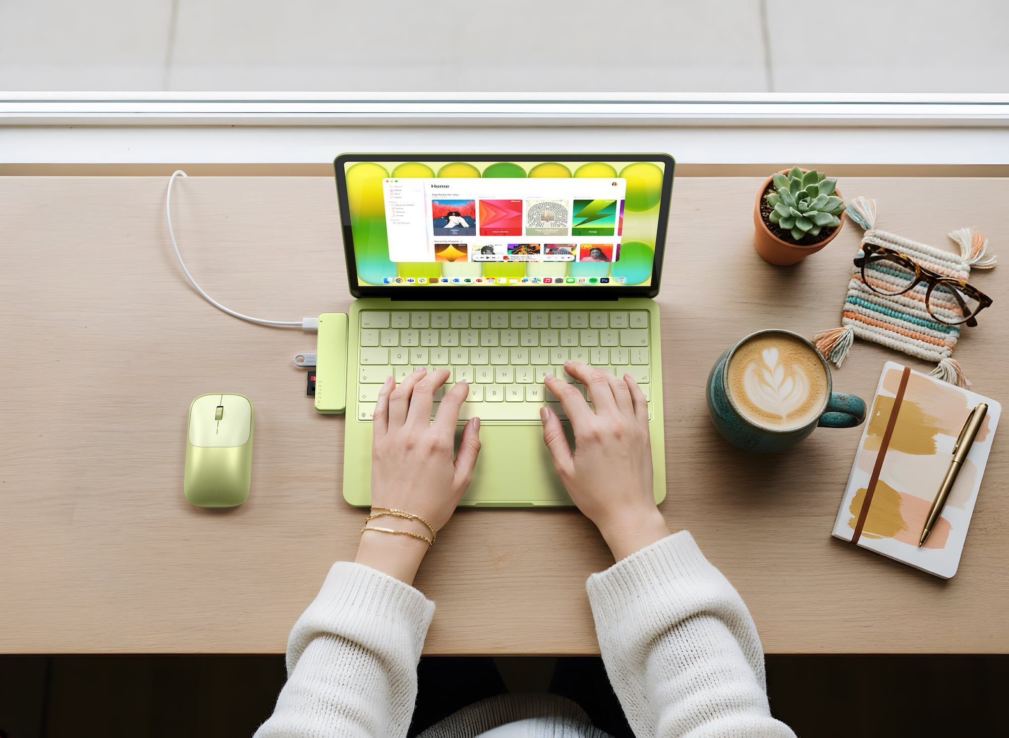 A person typing on a laptop