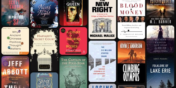 A group of books on a black background