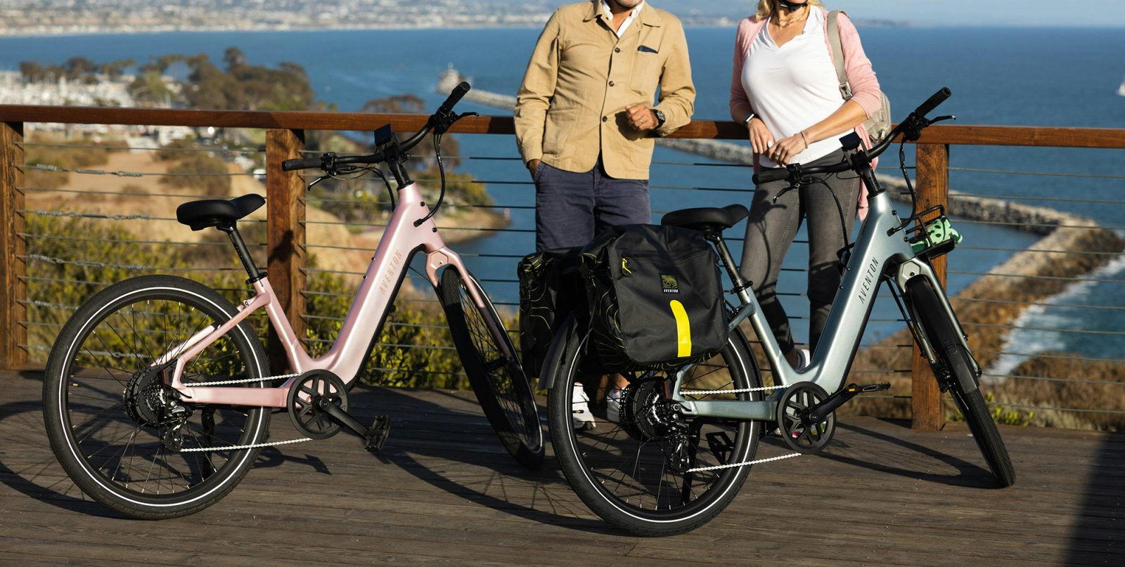 A man and woman standing next to bicycles