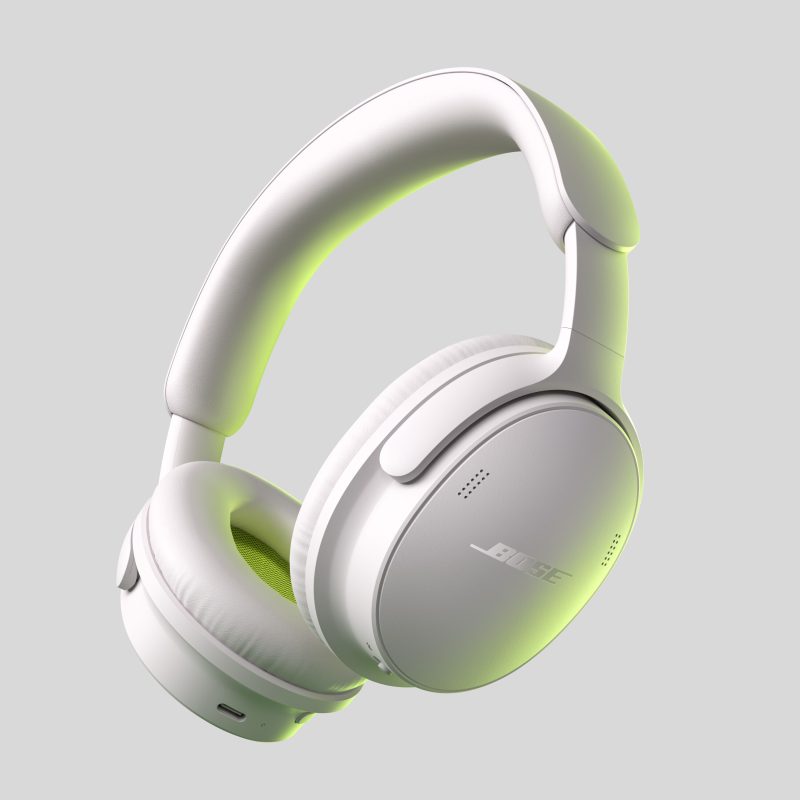 A white headphones with green lights