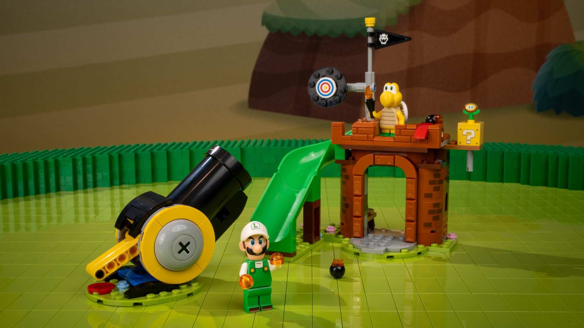 A toy building blocks on a green surface