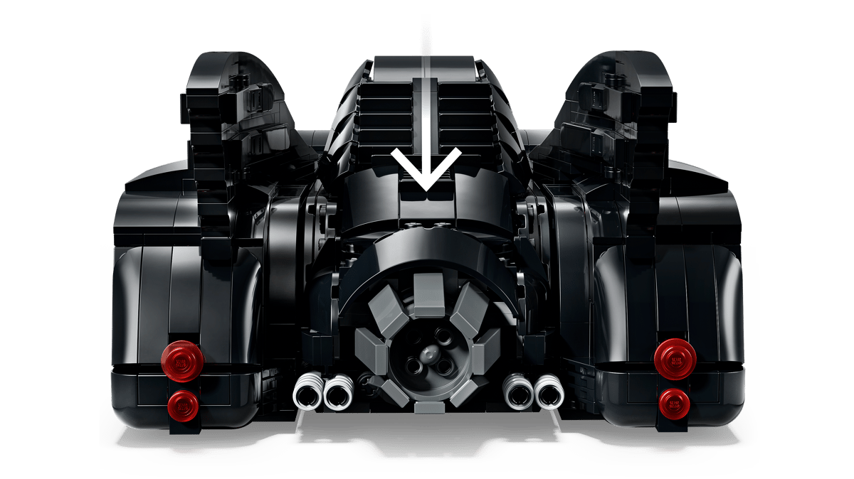 A black toy car with red lights