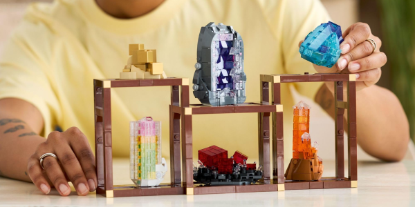 A group of plastic toys on shelves
