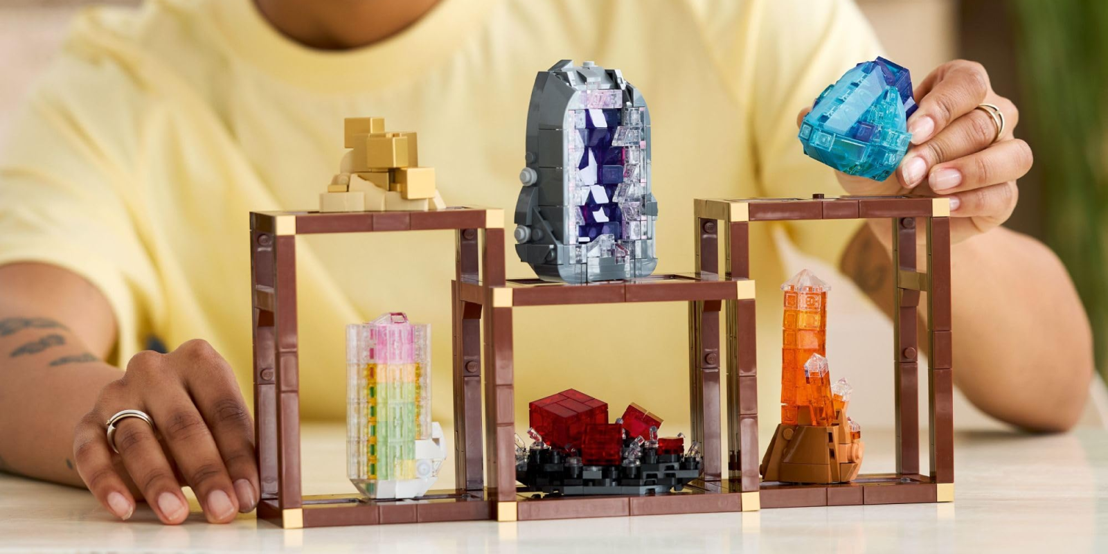 A group of plastic toys on shelves