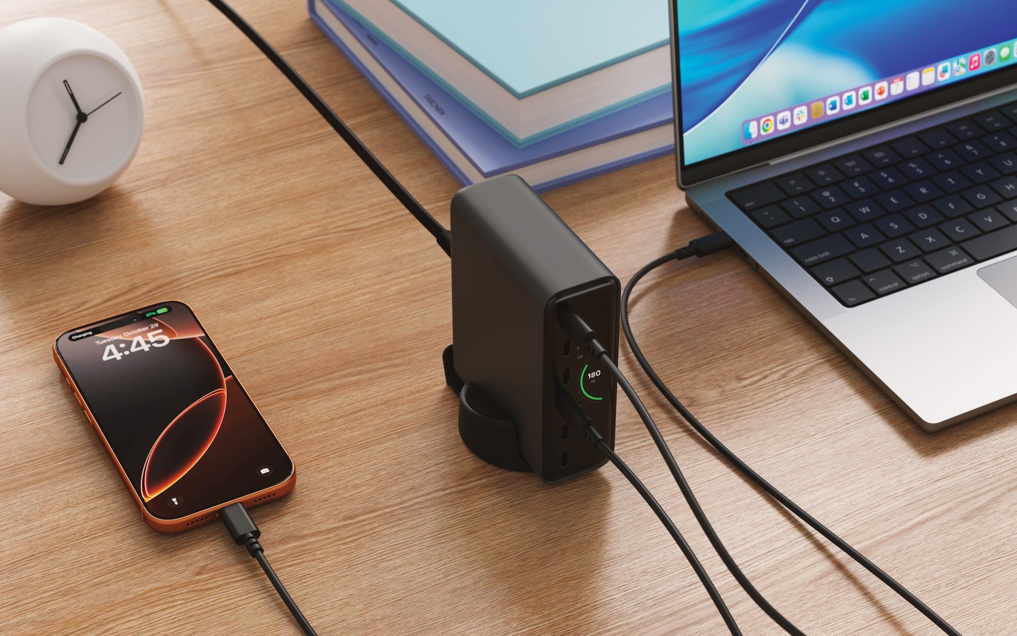 A laptop and phone connected to a charger