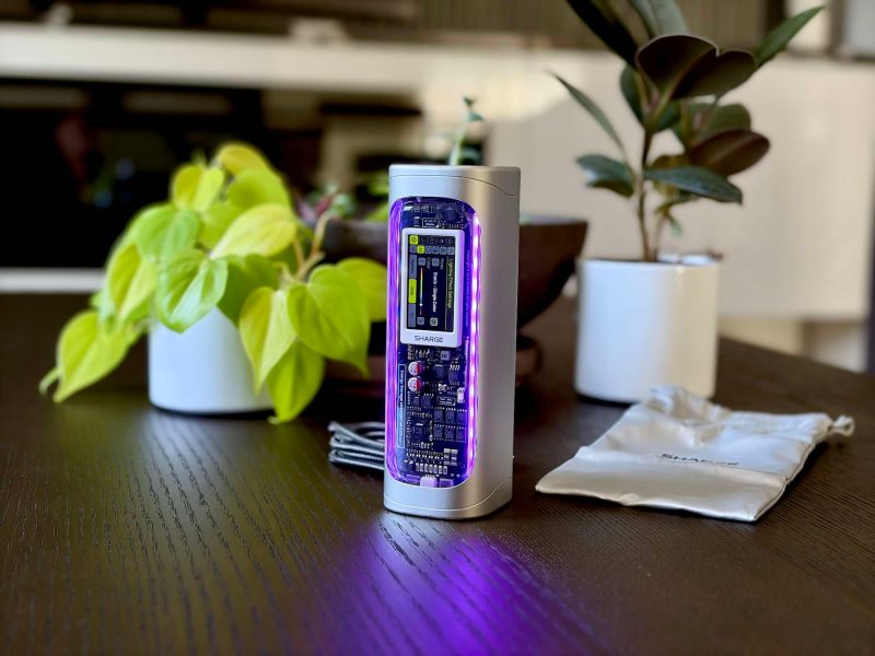 A device with a purple light on it