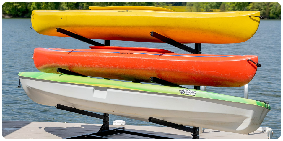 A group of kayaks stacked on top of each other