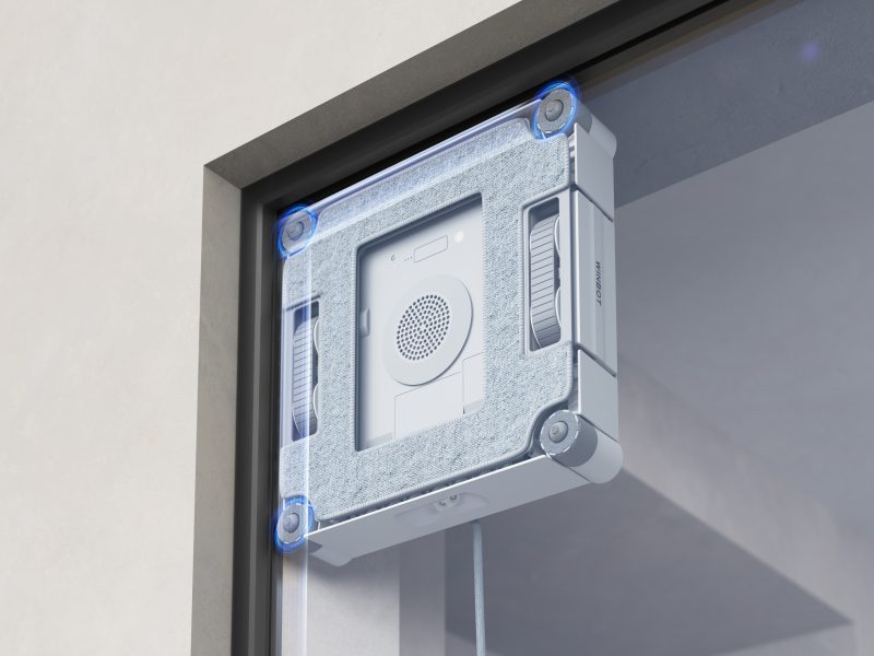 A white rectangular object with blue circles on it
