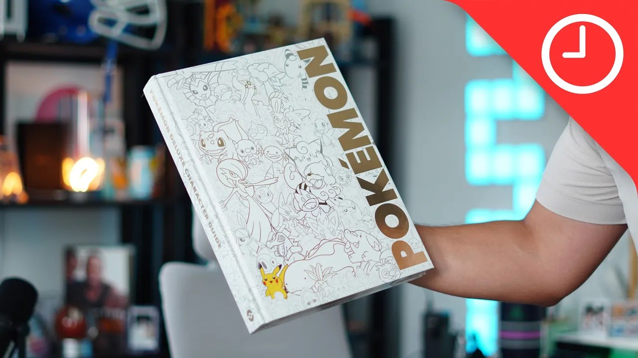 A hand holding a book