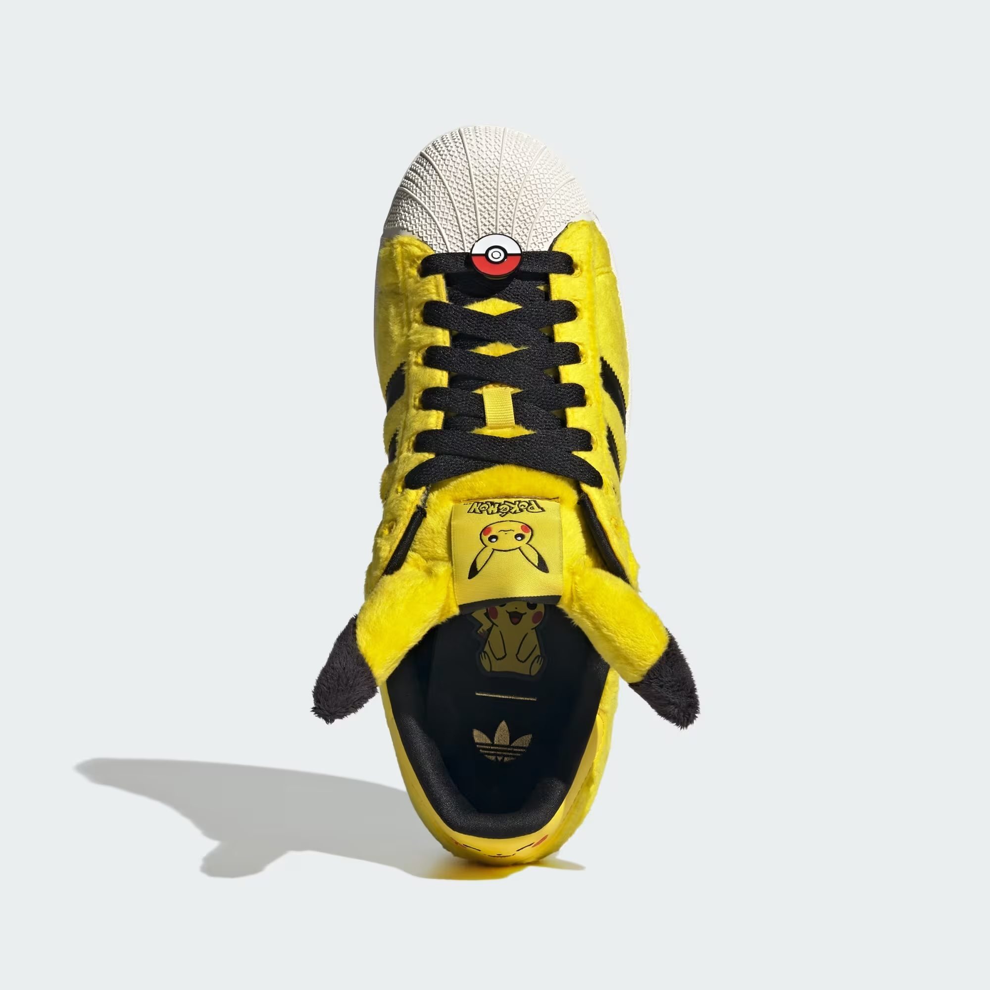 A yellow shoe with a cartoon character on it