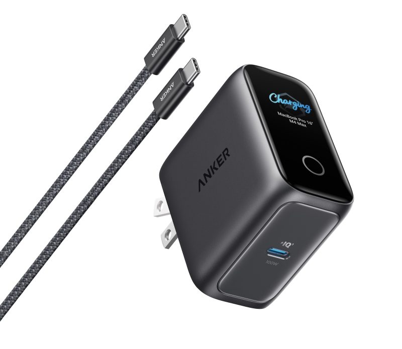 A black charging device with two cables