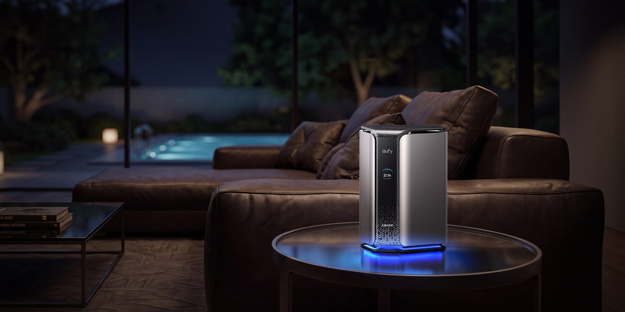 A silver and blue electronic device on a table in a living room