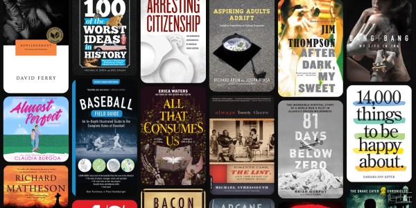 A collection of books on a black background