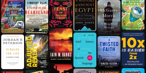 A collection of books on a black background