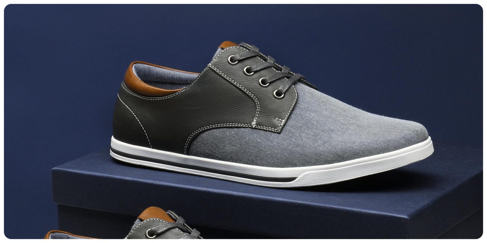 A pair of shoes on a blue box