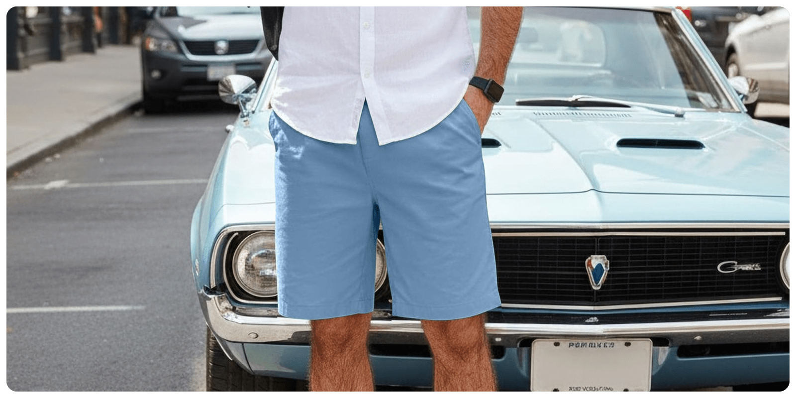 A man standing in front of a car
