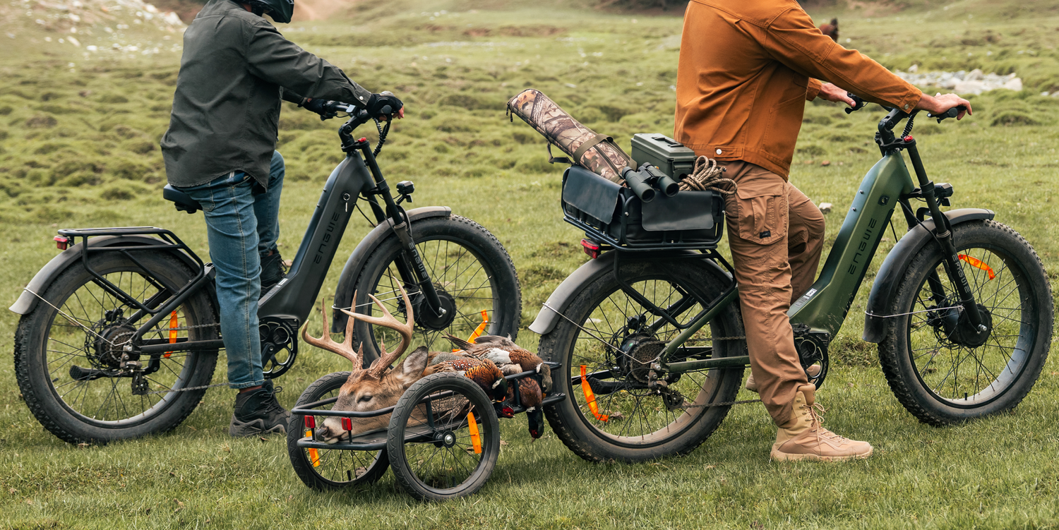 A man standing next to a bicycle with a deer in a cart