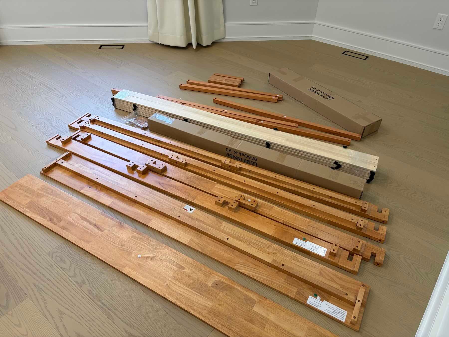 A group of wood pieces on a wood floor
