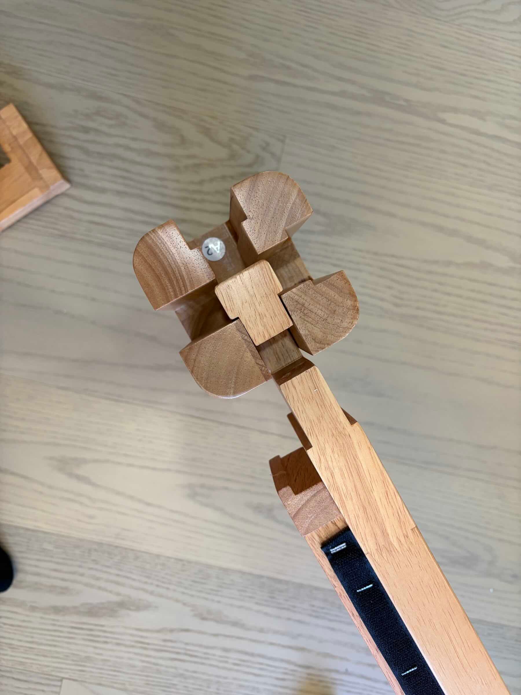 A wooden puzzle on a wood floor
