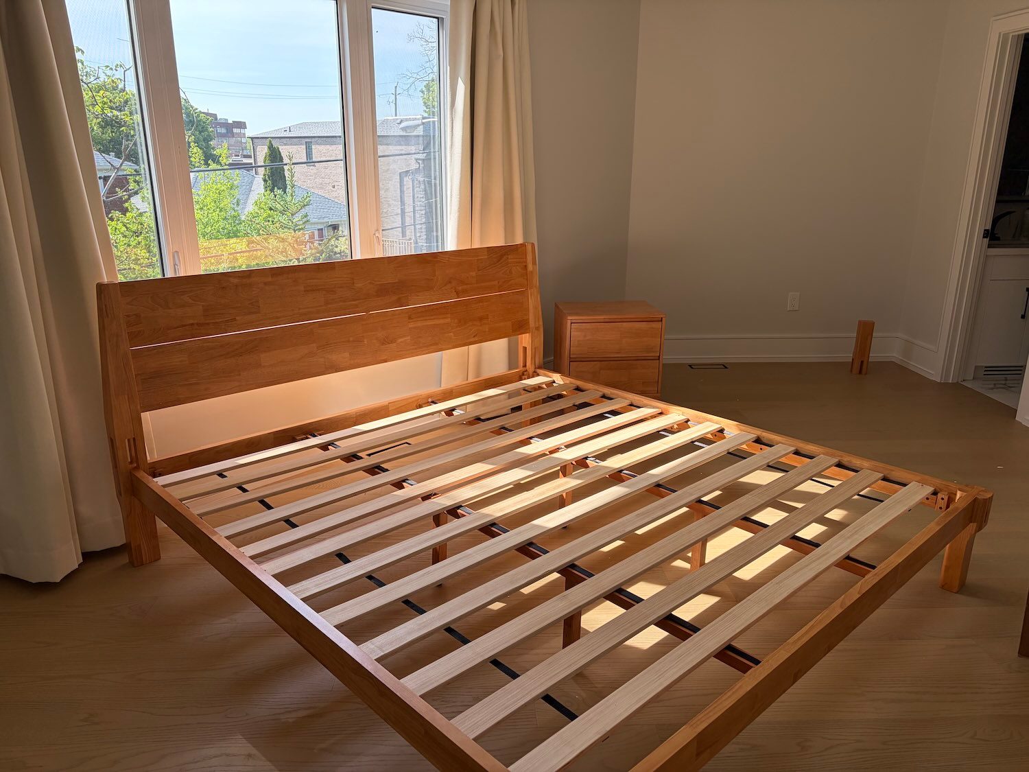 A bed frame in a room