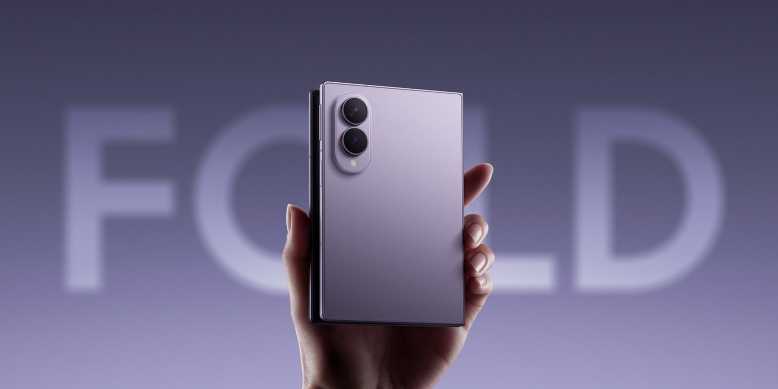 A hand holding a cell phone