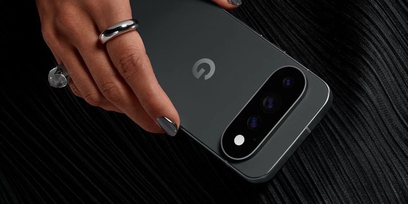 A hand holding a cell phone