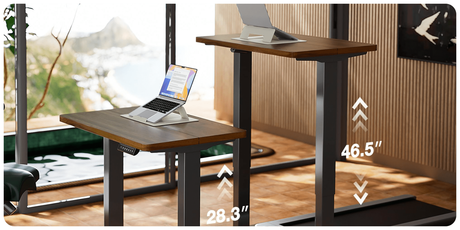 A laptop on a stand on a desk