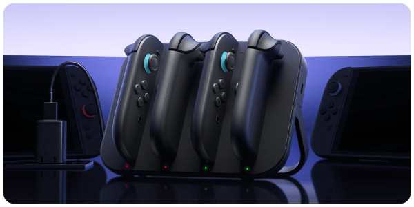 A group of gaming controllers in a charging station